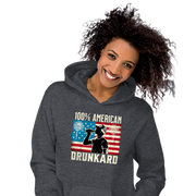 4th of July Hoodie with '100% American Drunkard' text, man drinking a bottle of beer wearing a trucker hat, and distressed American flag background