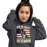 Hoodie with Give Me Liberty or Give Me a Shot of Bourbon text, Statue of Liberty holding a shot glass, and distressed American flag background. Perfect for 4th of July.