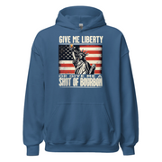 Hoodie with Give Me Liberty or Give Me a Shot of Bourbon text, Statue of Liberty holding a shot glass, and distressed American flag background. Perfect for 4th of July.
