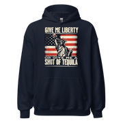 Hoodie with Give Me Liberty or Give Me a Shot of Tequila text, Statue of Liberty holding a shot glass, and distressed American flag background. Perfect for 4th of July.