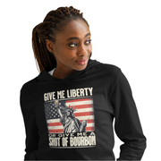 Lightweight hoodie with Give Me Liberty or Give Me a Shot of Bourbon text, Statue of Liberty holding a shot glass, and distressed American flag background. Perfect for 4th of July.