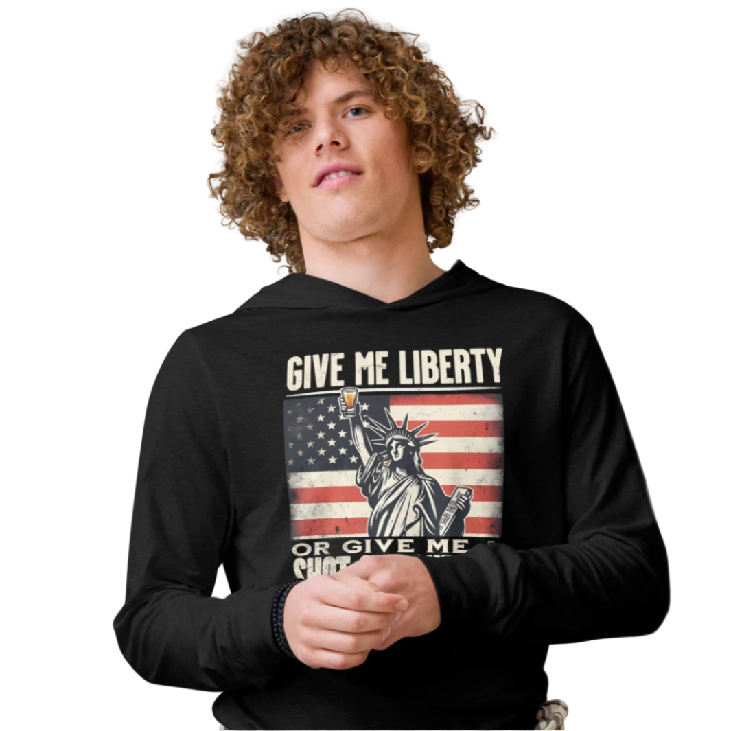 Lightweight hoodie with Give Me Liberty or Give Me a Shot of Bourbon text, Statue of Liberty holding a shot glass, and distressed American flag background. Perfect for 4th of July.