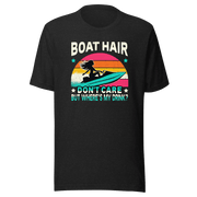 Tee with "Boar Hair Don't Care, But Where's My Drink?" and a woman on a jet ski against a retro sunset backdrop.