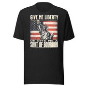 T-shirt with Give Me Liberty or Give Me a Shot of Bourbon text, Statue of Liberty holding a shot glass, and distressed American flag background. Perfect for 4th of July.