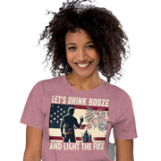 4th of July T-shirt with 'Let's Drink Booze and Light the Fuse' text, featuring a festive, patriotic theme