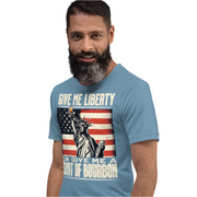 T-shirt with Give Me Liberty or Give Me a Shot of Bourbon text, Statue of Liberty holding a shot glass, and distressed American flag background. Perfect for 4th of July.