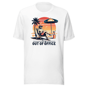 Man lounging in a beach chair with a cocktail, wearing our 'Sorry, Out of Office' vintage tee against a retro sunset backdrop.