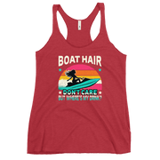 Racerback tank with "Boar Hair Don't Care, But Where's My Drink?" featuring a woman on a jet ski against a sunset.