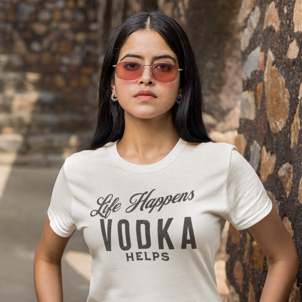 A Woman wearing a tshirt with the phrase Life Happens Vodka helps