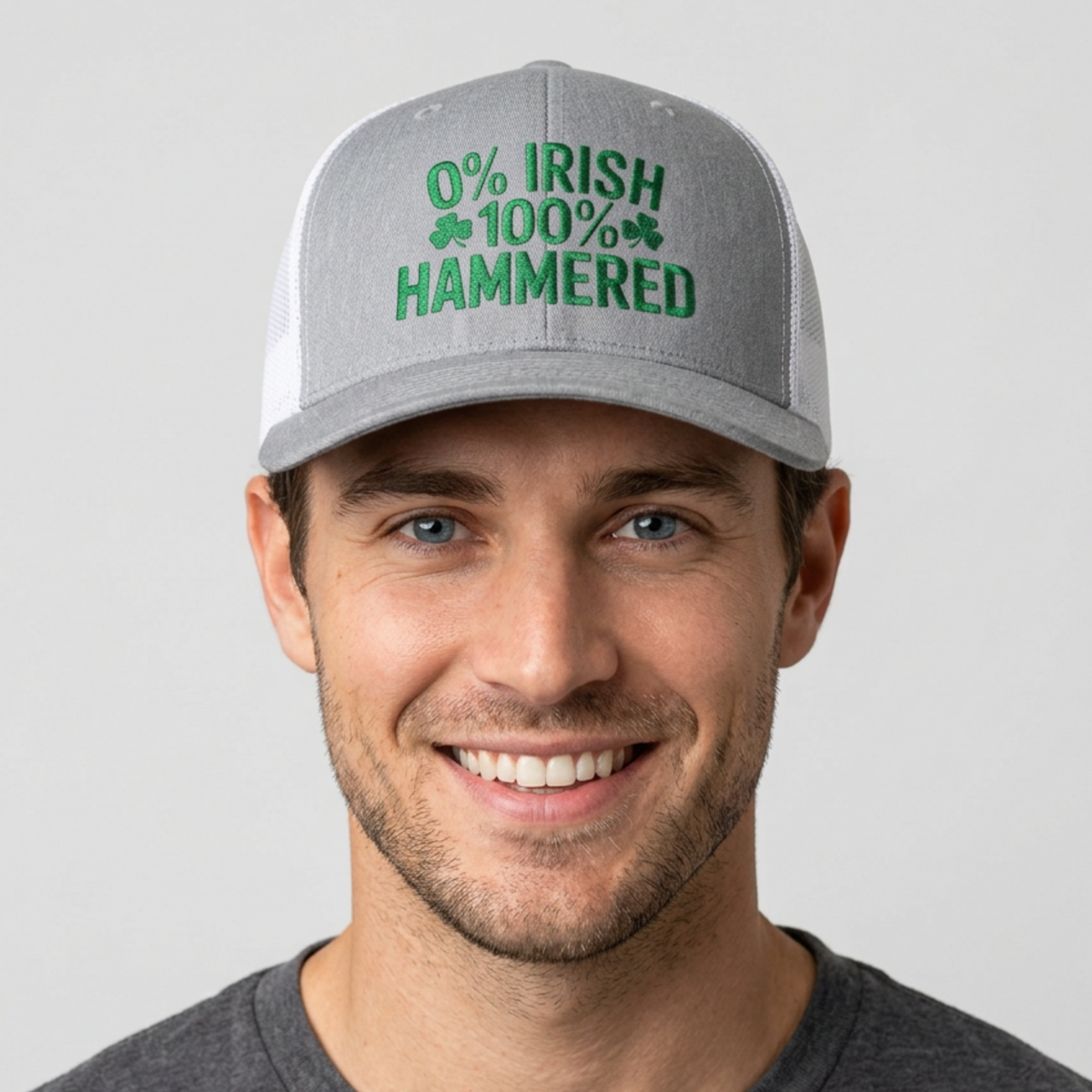 Man wearing a gray and white curved trucker hat with the phrase '0% Irish 100% HAMMERED' funny St Patricks Day Pub crawl and Parade design