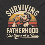 a heather navy lightweight hoodie with the phrase 'Surviving Fatherhood One Beer at a Time' funny Father's day gift for dad