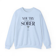 a light blue sweatshirt with the text 'You try parenting sober' funny mother's day, mom life, girls trips, beach trip design