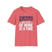 a coral t-shirt with the phrase 'Surviving Motherhood One Glass of Wine at a Time' funny Mother's day, beach vacation, spring break design