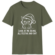 Funny Christmas Humor Short Sleeve Shirt with a grumpy cat wearing a santa hat and the text "Look at me being all Festive and Shit" - Military Green