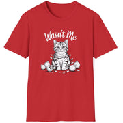 Funny Christmas Cat Humor Short Sleeve Shirt with a cute cat wrapped in christmas lights and surrounded by broken ornaments and the text "Wasn't Me" - Red