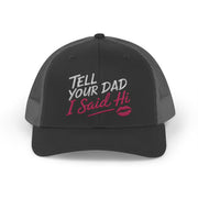 a black and gray curved trucker hat with the phrase "Tell Your Dad I said Hi" and lipstick kiss mark funny Spring Break, Girls Trip, Bachelorette Party, Beach Trip, or Summer Vacation design