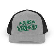Gray and black curved bill trucker hat with the text 'DIBS on the REDHEAD' funny st patricks day pub crawl design