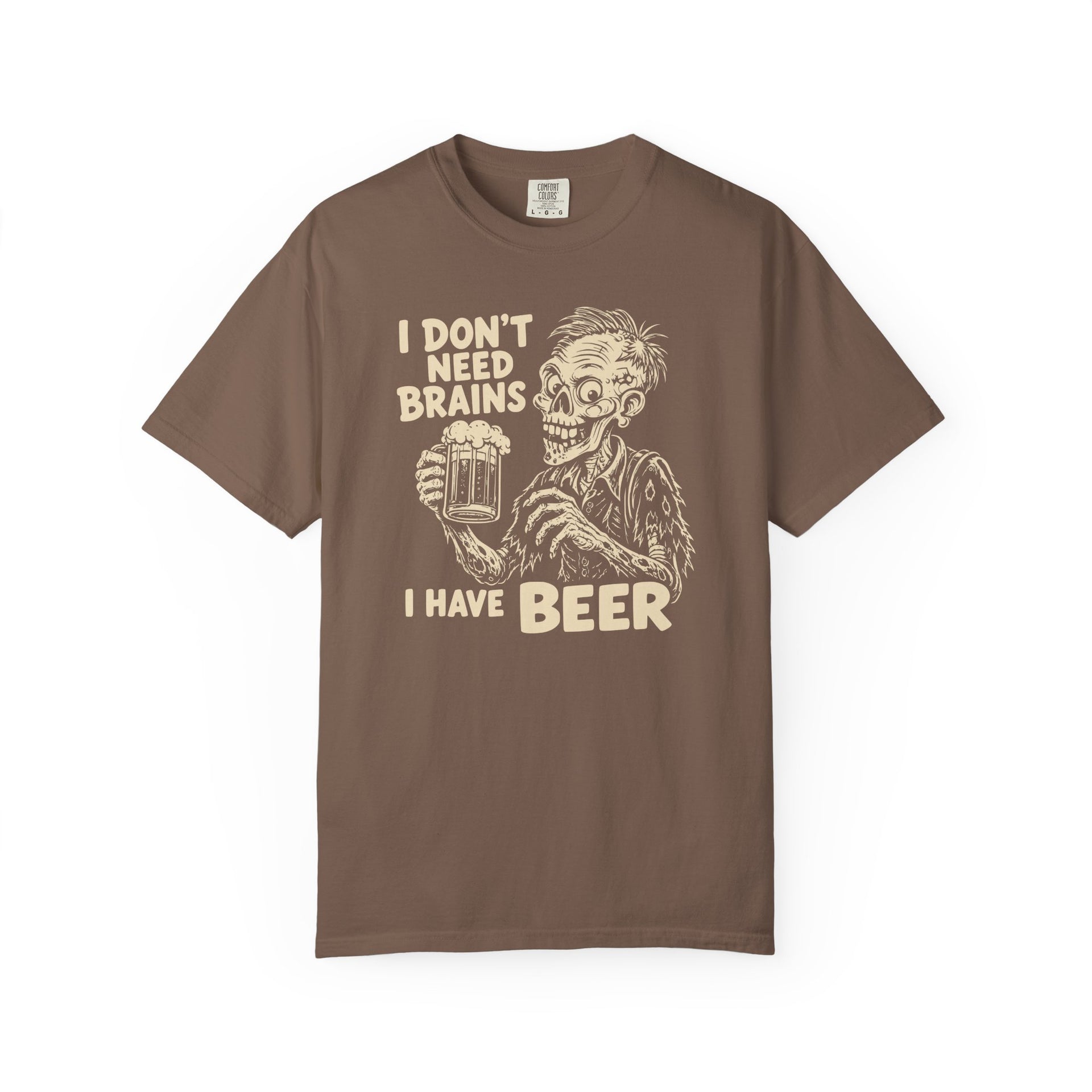 A brown short-sleeve crewneck t-shirt featuring a beige graphic of a zombie holding a beer mug with the text 'I DON'T NEED BRAINS I HAVE BEER'.