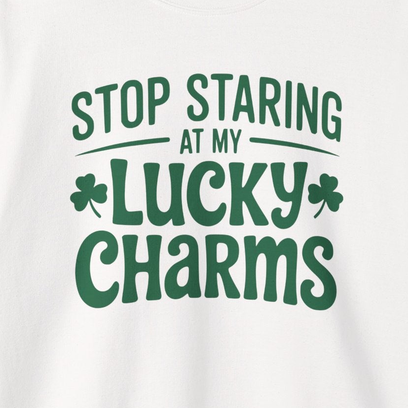 White sweatshirt with green text 'Stop Staring at My Lucky Charms' funny St Patricks Design