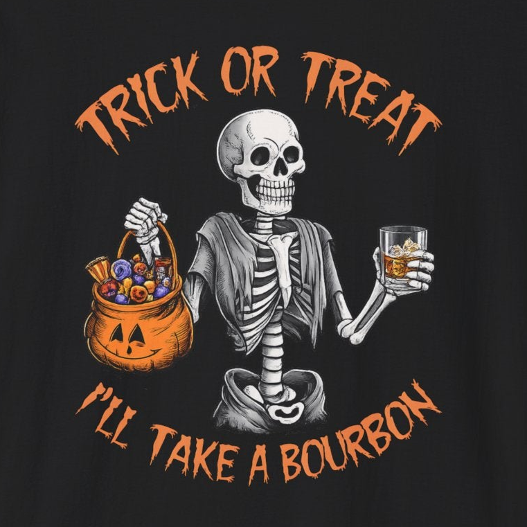 A black short-sleeve crewneck t-shirt featuring a Halloween graphic of a skeleton holding a whiskey glass next to a jack-o'-lantern bucket of candy, with the text 'TRICK OR TREAT I'LL TAKE A BOURBON' in orange.
