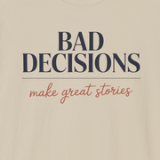a beige t-shirt with text 'Bad decisions make great stories' funny spring break, guys trip, girls trip, beach vacation, bachelor party, bachelorette party design