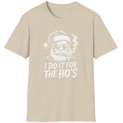 Beige t-shirt with a graphic of Santa Claus and text 'I Do It for the Ho's' funny christmas sweater