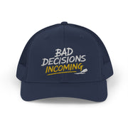 Woman wearing a navy curved trucker hat with embroidered text 'Bad Decisions Incoming'  funny Spring Break, Girls rips, Guys Trips, Beach Trips, Bachelor or Bachelorette design