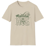 Funny Christmas Humor Short Sleeve Shirt with mistletoe and a santa hat and the text and the text "Mistletoe Hoe" - Sand