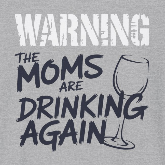 a gray t-shirt with the text 'Warning:the moms are drinking again' funny mother's day, beach trip, girls trip design