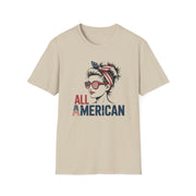 Beige t-shirt with graphic of a woman wearing sunglasses and an American flag headband, with 'All American' text.