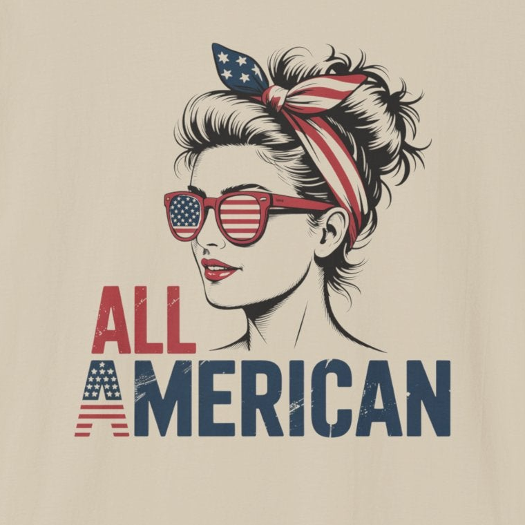 Beige t-shirt with graphic of a woman wearing sunglasses and an American flag headband, with 'All American' text.