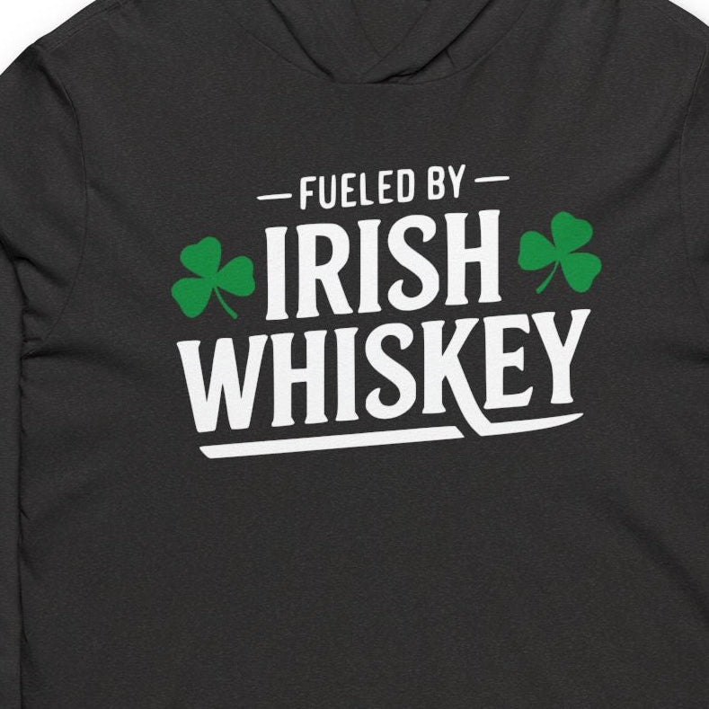 Black hoodie with 'Fueled by Irish Whiskey' text and shamrock design on a white background