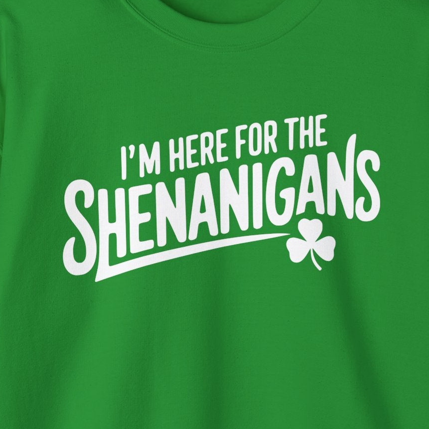 green sweatshirt with the phrase 'I'm here for the Shenanigans' funny St Patricks Day design