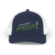 a navy and white curved bill trucker hat with the phrase'You Had Me at Mimosas' text funny Spring break, girls trip, guys trip, beach trip, summer vacation, lake season design
