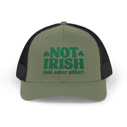a green and black curved bill trucker hat with 'Not Irish (not either other)' text funny St Patricks Day pub crawl design