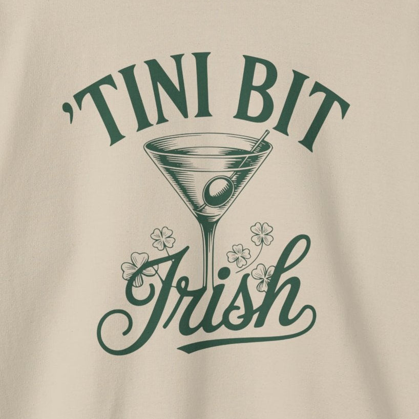 Beige sweatshirt with 'Tini Bit Irish' text and martini glass graphic on a white background