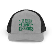 a gray and black curved trucker hat with the phrase Stop Staring at My Lucky Charms funny St Patricks Day pub crawl or parade design