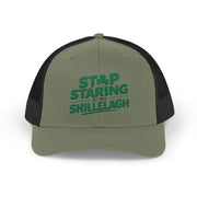 a green and black curved trucker hat with the phrase "Stop Staring at my Shillelagh" funny St Patricks Day pub crawl or parade design