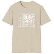Funny Christmas Drinking Humor Short Sleeve Shirt with a Wine Bottle and the text "I'm Trying to get into the Holiday Spirit but I cant get the Bottle Open" - Sand