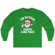 Green long-sleeve shirt with Santa Claus graphic and text on a white background