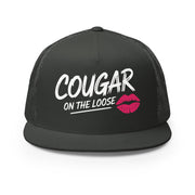 a charcoal flat bill trucker hat with the phrase 'Cougar on the Loose' funny beach trip, girls trip, bachelorette party, or spring break design