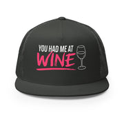 Charcoal flat bill trucker hat with 'You Had Me at Wine' text and wine glass graphic funny spring break hat