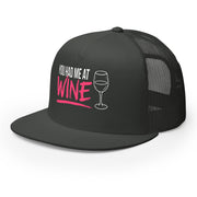 Charcoal flat bill trucker hat with 'You Had Me at Wine' text and wine glass graphic funny spring break hat