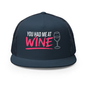 Navy flat bill trucker hat with 'You Had Me at Wine' text and wine glass graphic funny spring break hat