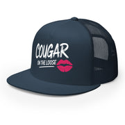 a navy flat bill trucker hat with the phrase 'Cougar on the Loose' funny beach trip, girls trip, bachelorette party, or spring break design