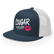 a navy and white flat bill trucker hat with the phrase 'Cougar on the Loose' funny beach trip, girls trip, bachelorette party, or spring break design