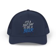  a navy trucker hat with teh phrase its a bad day to be a beer funny spring break, guys trip, girls trip, beach trip, lake season design