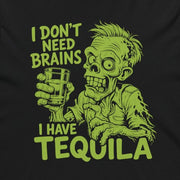 A black long-sleeve hoodie with a lime green graphic on the front showing a zombie holding a tequila glass, with the text 'I DON'T NEED BRAINS I HAVE TEQUILA'.