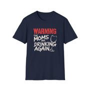 a navy t-shirt with the text 'Warning:the moms are drinking again' funny mother's day, beach trip, girls trip design