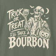 A close-up of a dark olive green graphic print featuring a skeleton wearing sunglasses, holding a glass of bourbon and a pumpkin bucket of candy, with the text 'TRICK OR TREAT I'LL TAKE A BOURBON'.
